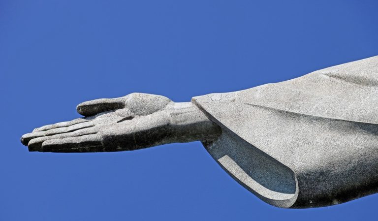 Close-up of Christ the Redeemer statue in Rio de Janeiro featured in this things to do in Rio de Janeiro guide