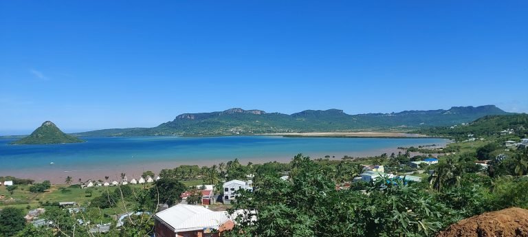 Panoramic coastal view on the road to Ramenas Beach near Diego Suarez with turquoise bay and green hills