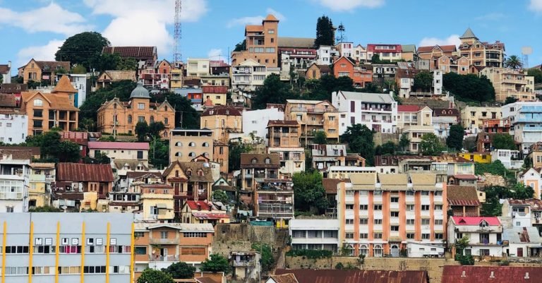 Hillside neighborhoods of Antananarivo with colorful houses layered across the capital’s steep terrain.