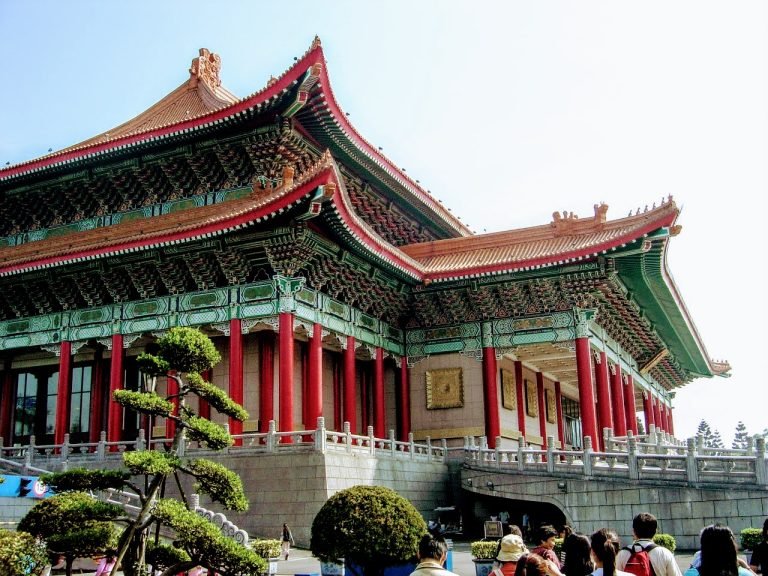 National Concert Hall in Taipei with red columns, green roof tiles, and traditional Chinese-style architecture.