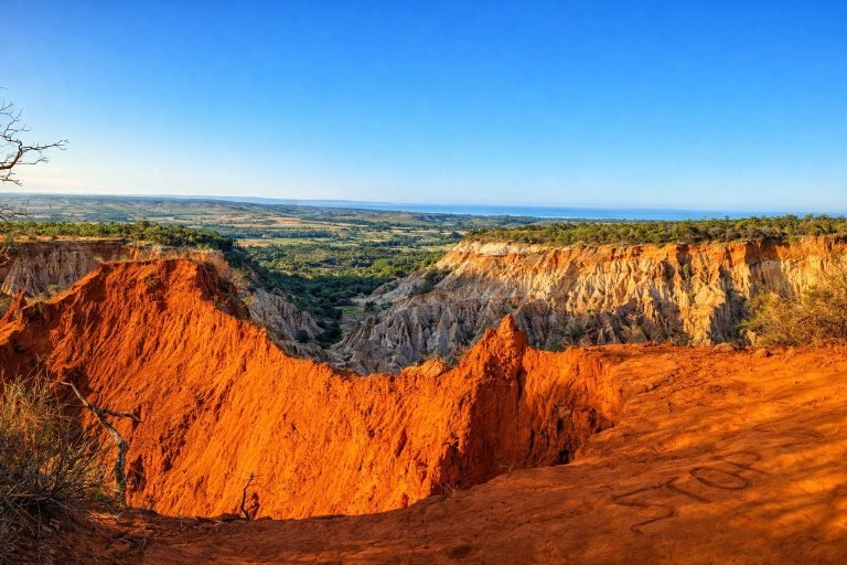 ankarafantsika national park madagascar red sandstone canyon landscape under blue sky 📸 Caption 📖 Description
