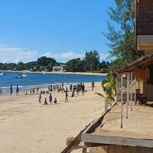 Children playing on a beach in Nosy Be Madagascar