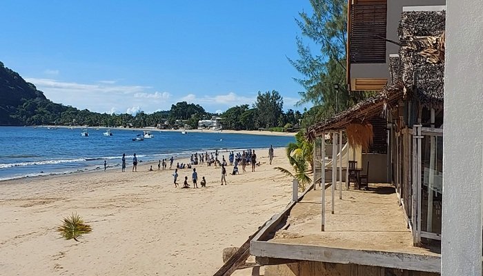 Children playing on a beach in Nosy Be Madagascar