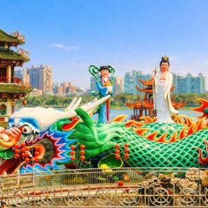 Taiwan itinerary - Dragon and Tiger Pagodas and colorful dragon statue at Lotus Pond in Kaohsiung, Taiwan on a sunny day