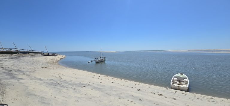 Madagascar beaches with traditional fishing boats and sandbanks along the coast Caption Description