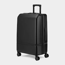 Nomatic Check-In Classic travel suitcase with spinner wheels