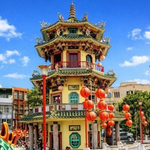 Best time to visit Taiwan: Dragon and Tiger Pagodas temple with red lanterns under blue skies in Kaohsiung, Taiwan