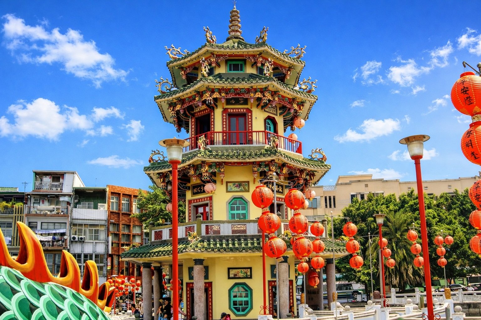 Best time to visit Taiwan: Dragon and Tiger Pagodas temple with red lanterns under blue skies in Kaohsiung, Taiwan