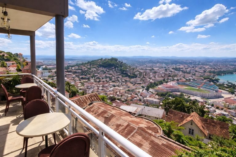 Is Madagascar safe to visit - panoramic city view of Antananarivo Madagascar from terrace with bright blue skies
