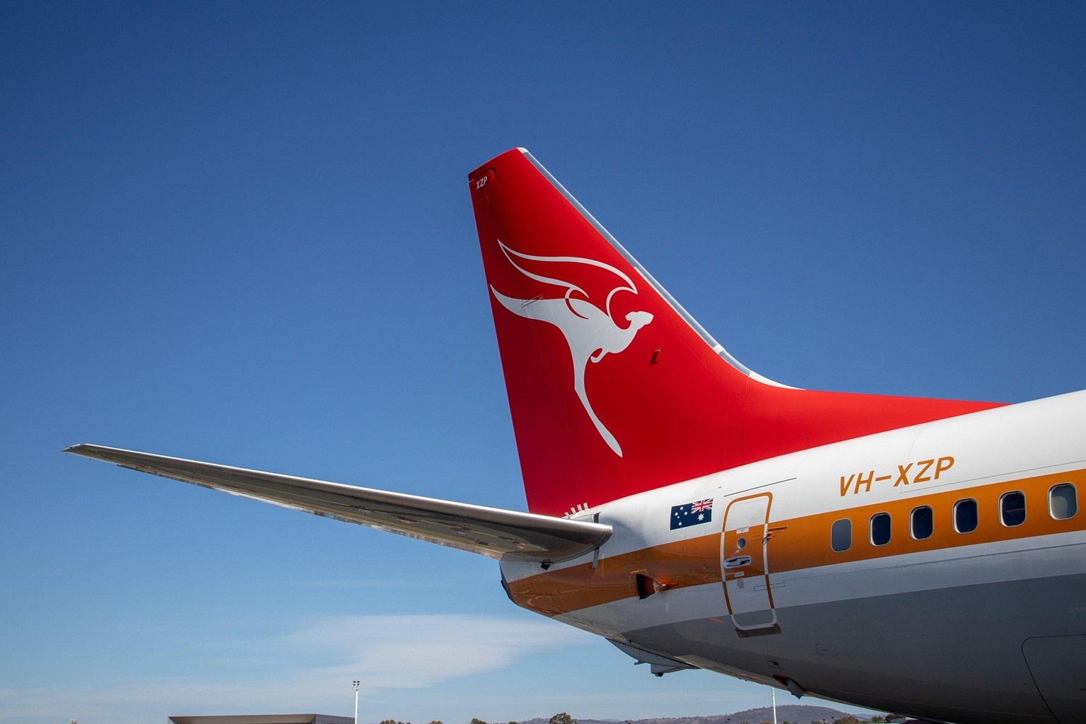 Sydney Airport Transport - Qantas airplane tail with kangaroo logo at Sydney Airport
