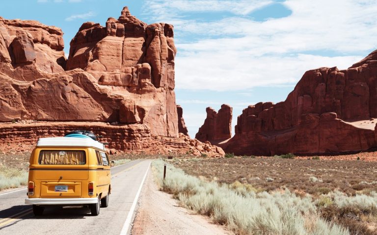 Road trip through desert highlighting credit-card-travel-insurance-vs-travel-insurance for travel protection planning