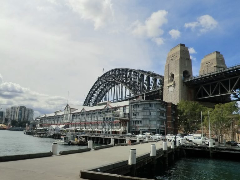 Sydney Harbour Bridge view from Walsh Bay waterfront with public transport in Sydney using Opal card Sydney system nearby
