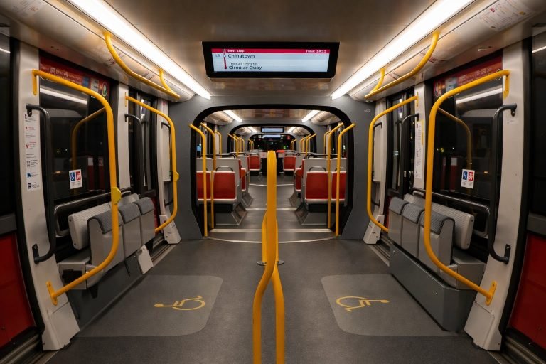 Sydney light rail interior empty carriage Chinatown stop display