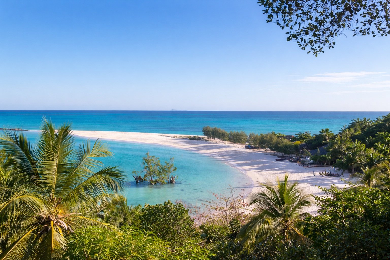 Where to stay in Madagascar - Beach resort near Nosy Be with white sand and turquoise water