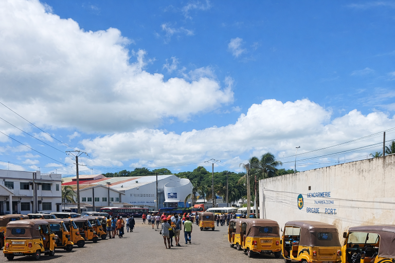 Madagascar Travel Tips - Madagascar city street with tuk tuks and local transport