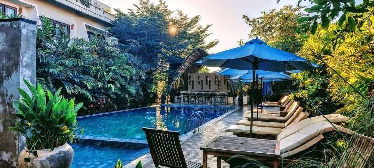 cost of traveling in cambodia boutique hotel pool affordable accommodation tropical setting
