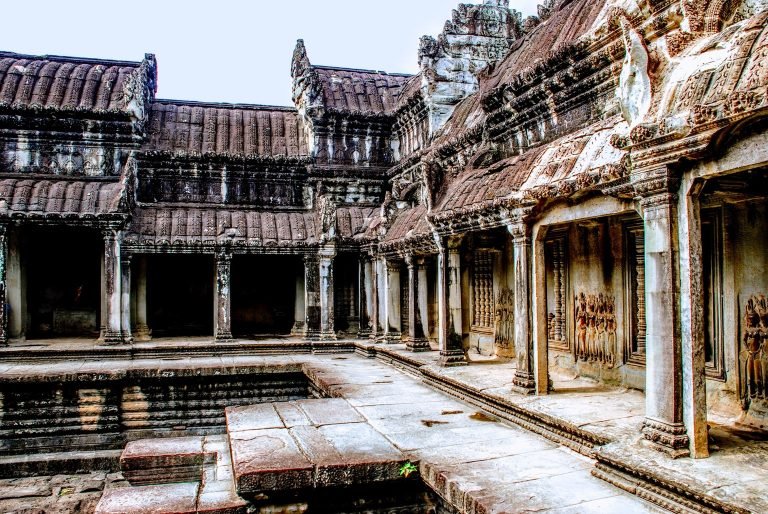Angkor Wat inner courtyard with stone corridors columns and apsara carvings in Siem Reap Cambodia
