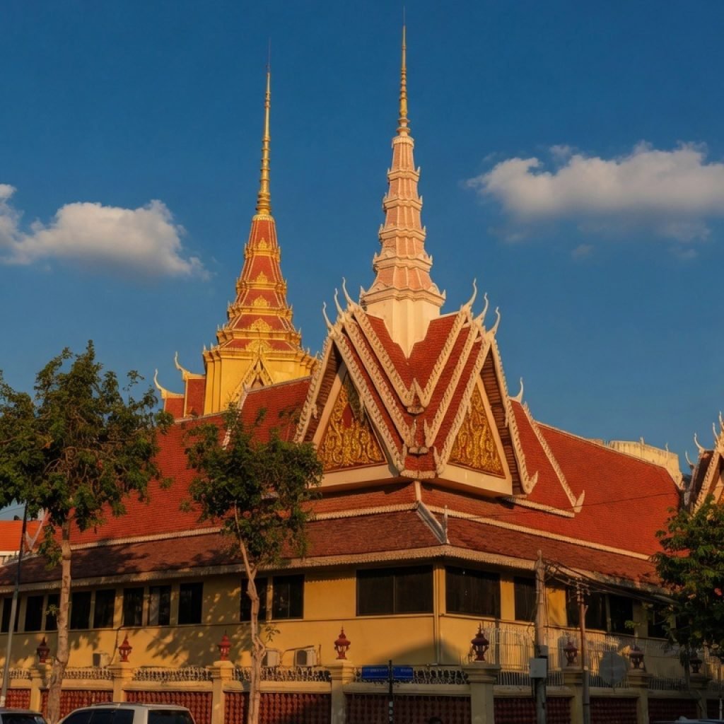 Cambodia travel tips - Temple in phnom penh with blue sky and traditional architecture