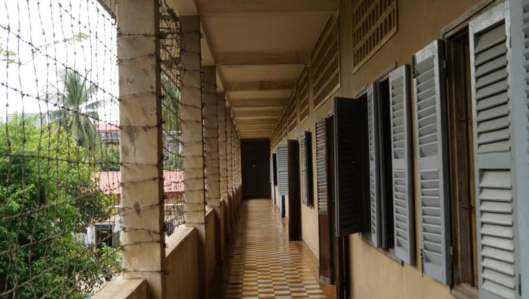 corridor with barbed wire at tuol sleng s21 genocide museum phnom penh cambodia
