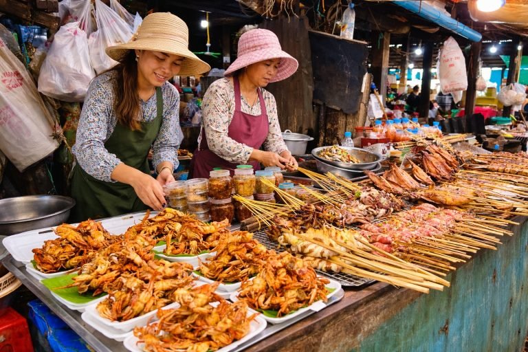 Things to do in Kampot - Crab market fresh seafood grilled skewers and local vendors
