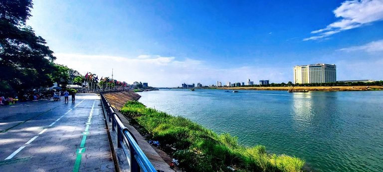 Phnom Penh itinerary riverside esplanade view with Sokha Hotel across the river