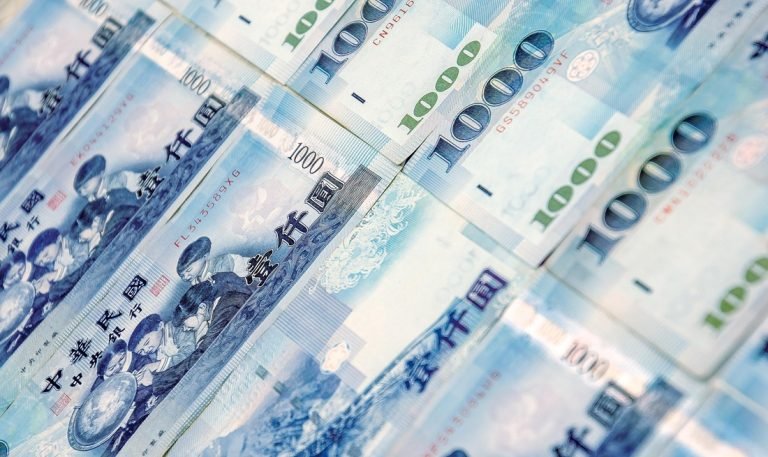 Food in Taiwan cost concept with Taiwanese dollar banknotes used for street food and meal prices