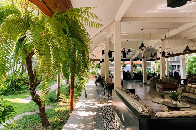Things to do in Siem Reap include staying in stylish hotels with open-air lobbies, tropical plants, and modern Khmer-inspired design
