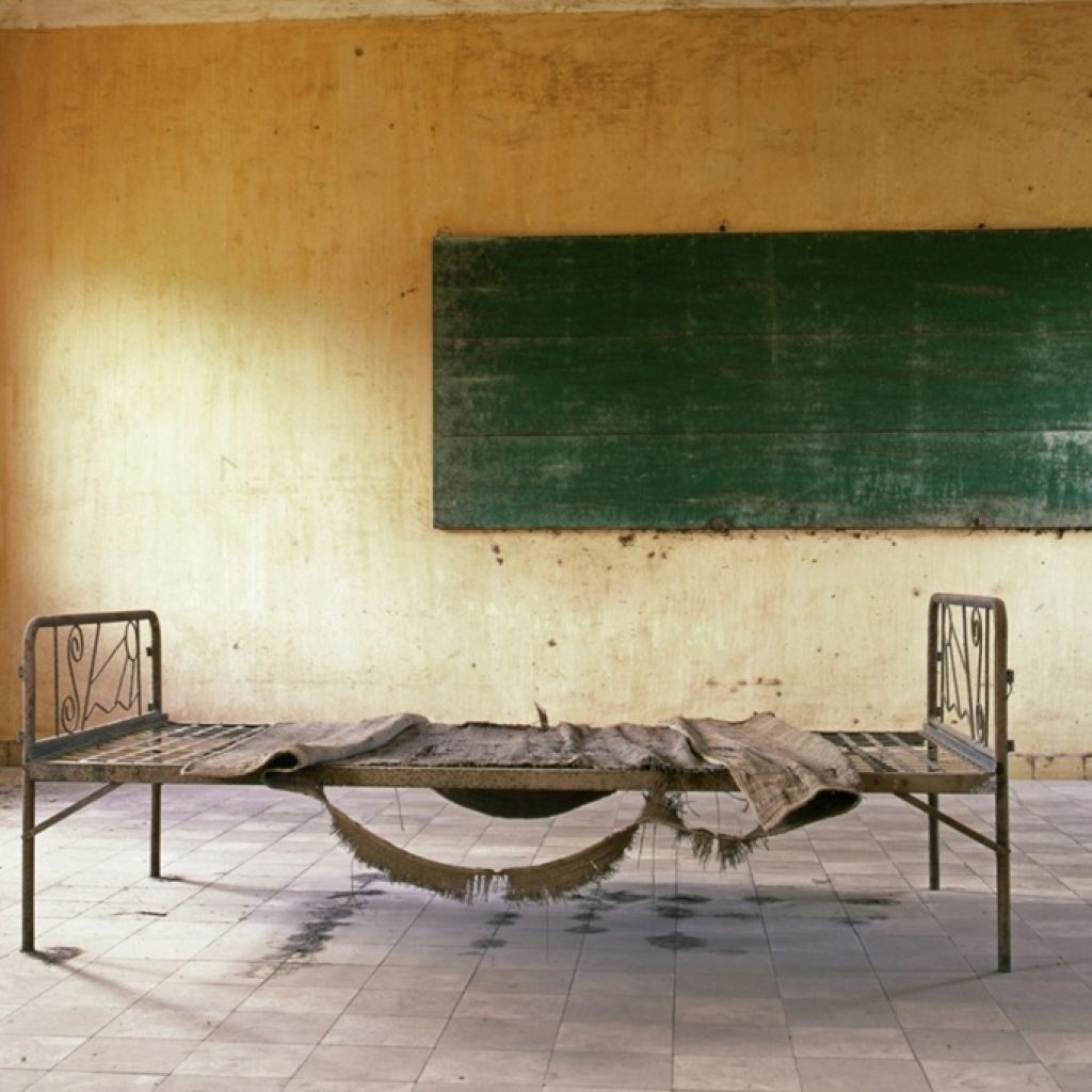 interrogation room with metal bed at tuol sleng s21 genocide museum phnom penh