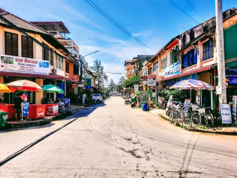 Things to do in Kampot - Street with colonial buildings local shops and quiet town atmosphere