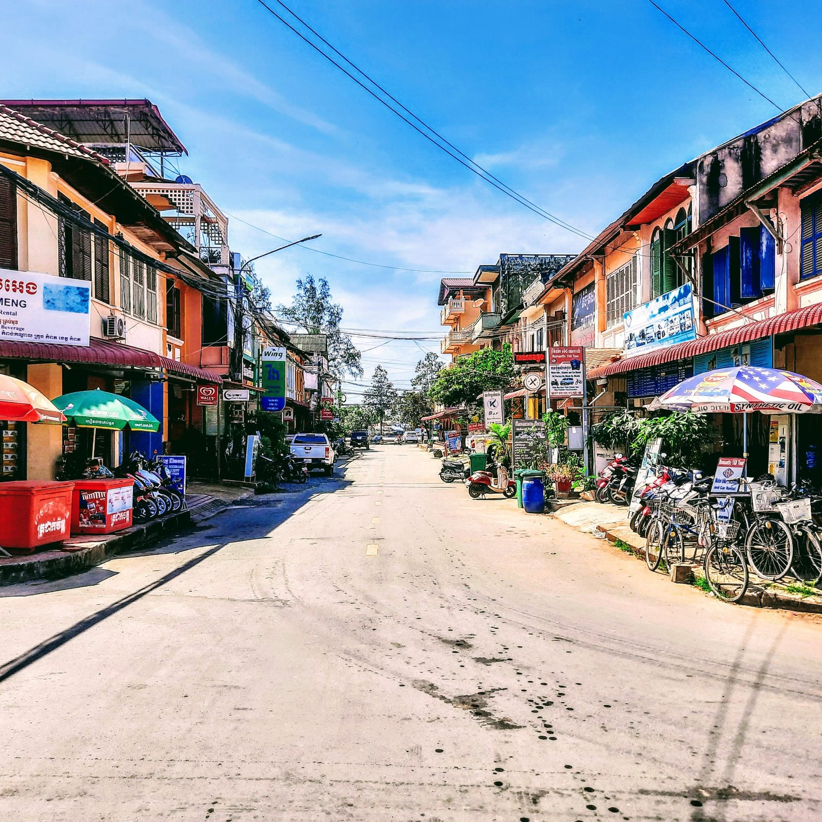 Things to do in Kampot - Street with colonial buildings local shops and quiet town atmosphere