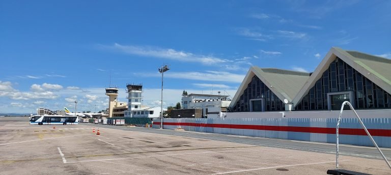 Nosy Be Fascene Airport terminal and runway in Madagascar under blue skies Caption: Description: