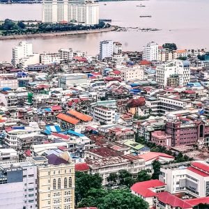 Cambodia itinerary - View over Phnom Penh skyline and Mekong River showing city layout and travel route planning inspiration