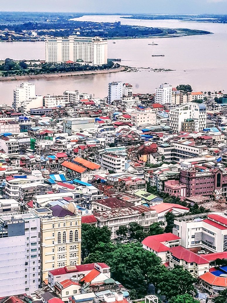 Cambodia itinerary - View over Phnom Penh skyline and Mekong River showing city layout and travel route planning inspiration