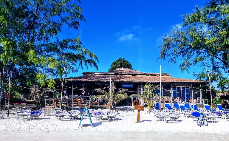 Sara Resort on Koh Rong Samloem with beachfront seating, white sand, and tropical surroundings