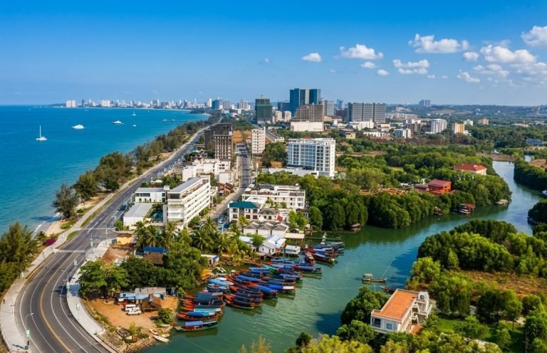 Sihanoukville Cambodia aerial view with coastline, river, boats, and city skyline