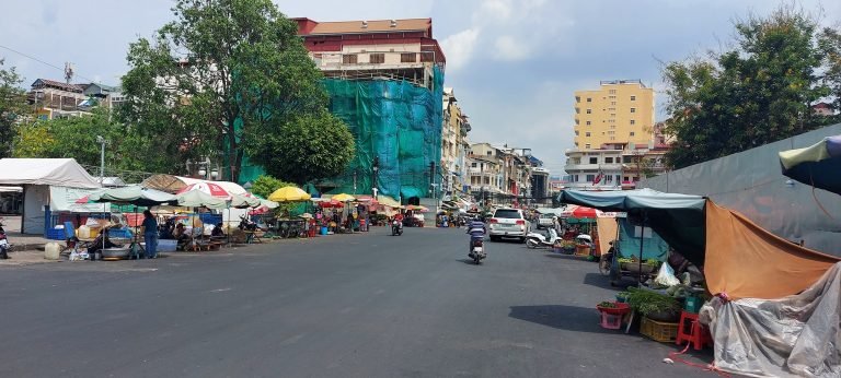 Things to do in Phnom Penh street market with local vendors and roadside stalls Caption: Description: