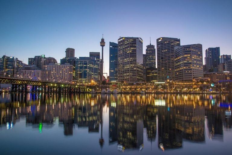 Sydney CBD skyline dusk reflection waterfront city lights Darling Harbour