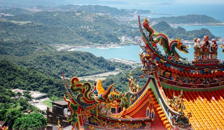 Taiwan travel tips for visiting temples with panoramic coastal views and exploring northern Taiwan landscapes