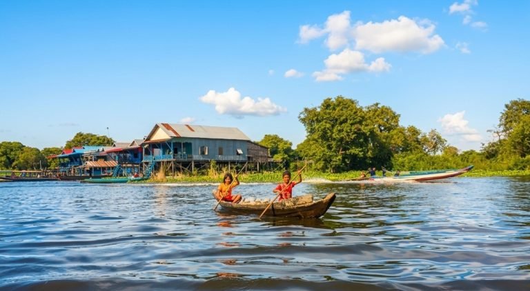 tonle sap floating village children on boat daily life cambodia lake Caption Description