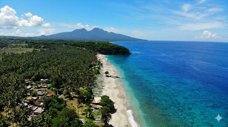 White sand coastline and turquoise water at Virgin Beach in Bali beaches along East Bali