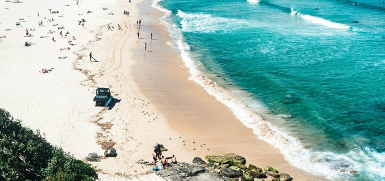 Turquoise waves and golden sand at Bondi Beach, one of the most famous beaches in Sydney