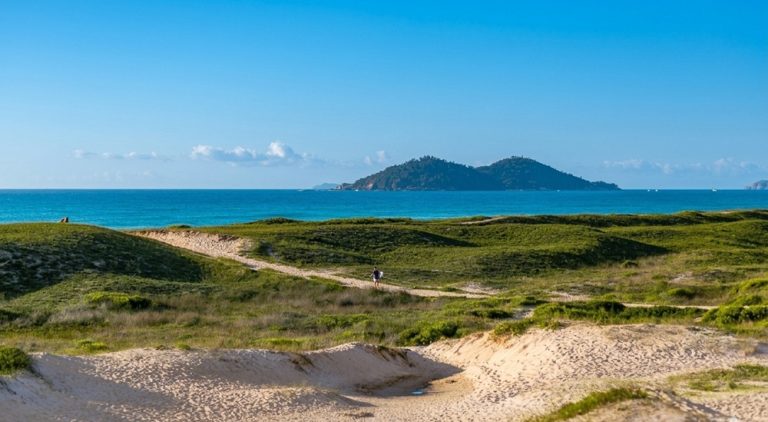 Coastal sand dunes overlooking the Atlantic Ocean and offshore island near Florianópolis