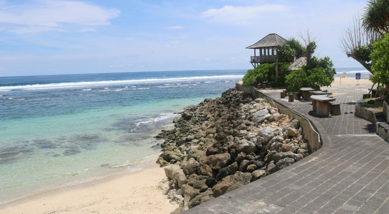 Turquoise coastline and seaside walkway at Melasti Beach in Bali beaches on the Bukit Peninsula Caption: Description: