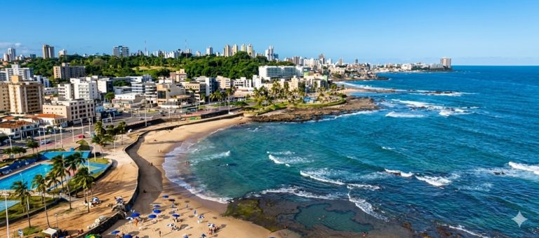 Aerial view of Ondina beach and coastline in Salvador Brazil with turquoise ocean and city skyline Caption: Description:
