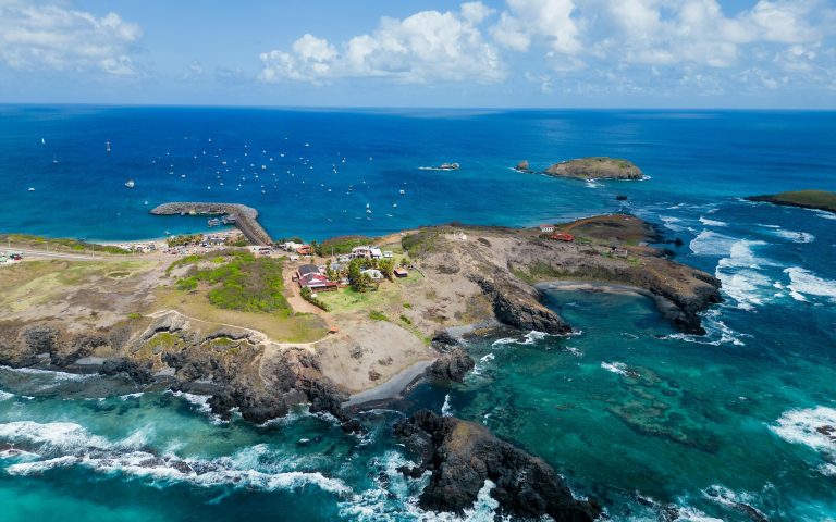 Aerial coastline of Pernambuco featured in this Northeast Brazil travel guide with turquoise Atlantic waters
