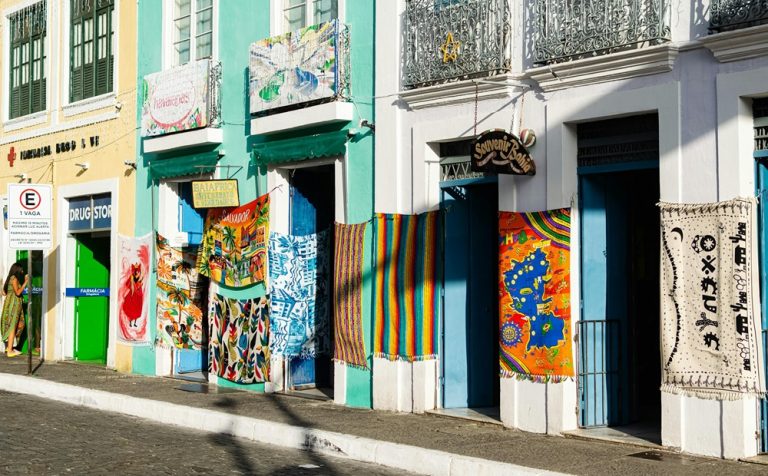 Traditional souvenir shops and colonial buildings showing where to stay in Salvador, Brazil Caption: Description: