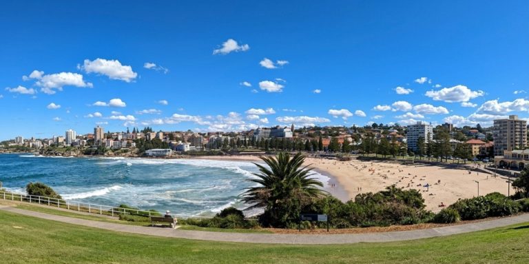 Panoramic view of Coogee Beach, one of the most popular beaches in Sydney for swimming and coastal walks Caption: Description:
