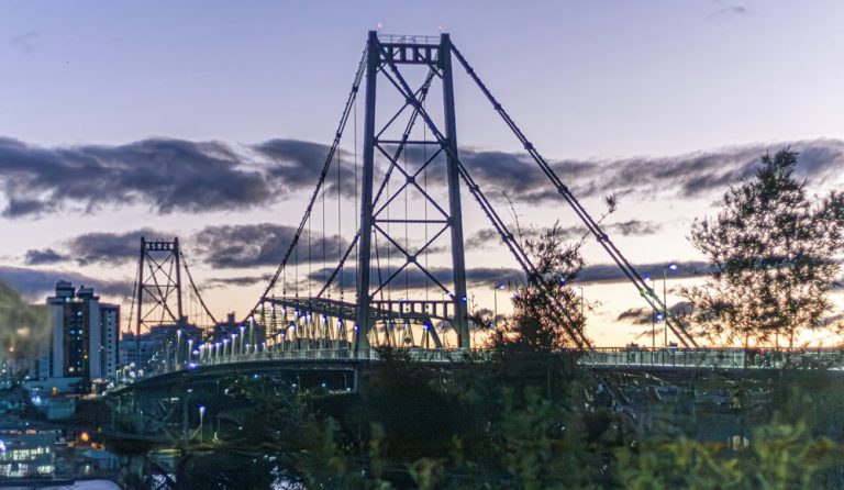 Things to Do in Florianópolis Brazil evening view of Hercílio Luz Bridge connecting Santa Catarina Island to mainland Brazil Caption: Description: