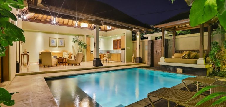 Luxury private villa with swimming pool and tropical architecture in Bali