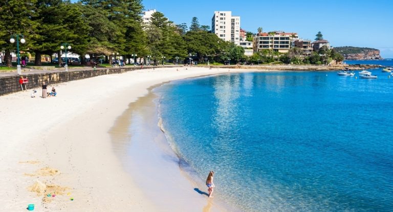 Calm shoreline and clear blue water at Manly Beach, one of the most popular beaches in Sydney Caption: Description: